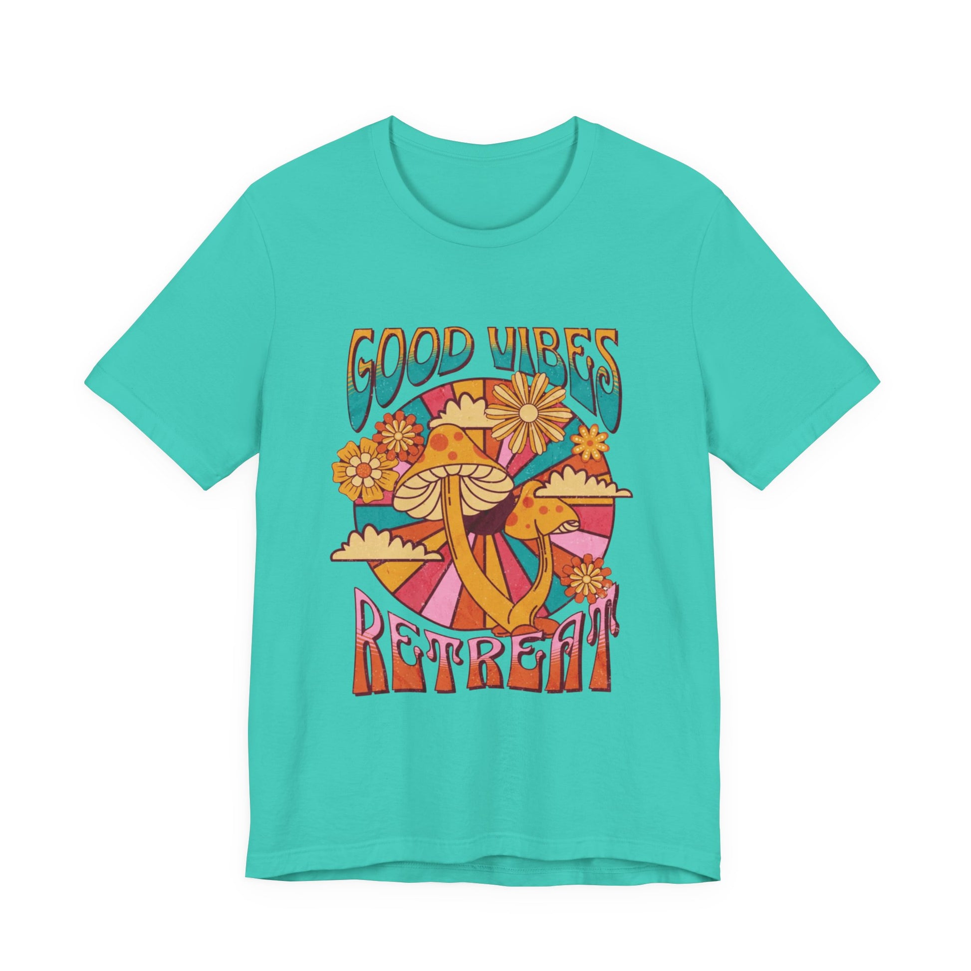 Women turquoise short-sleeve crewneck t-shirt featuring a colorful retro 70s-style graphic with mushrooms, flowers, and the words 'GOOD VIBES RETREAT' | AH Urban Wear PK